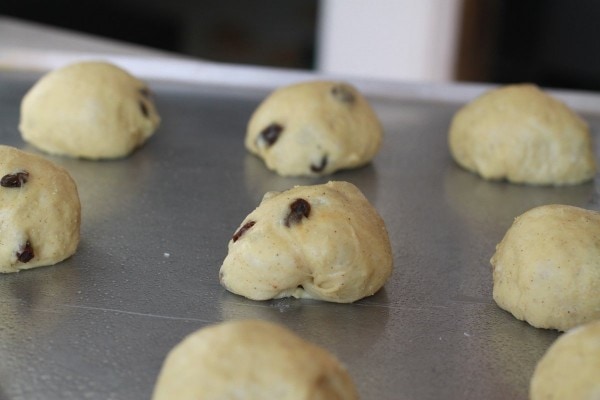 dough balls on a baking sheet.